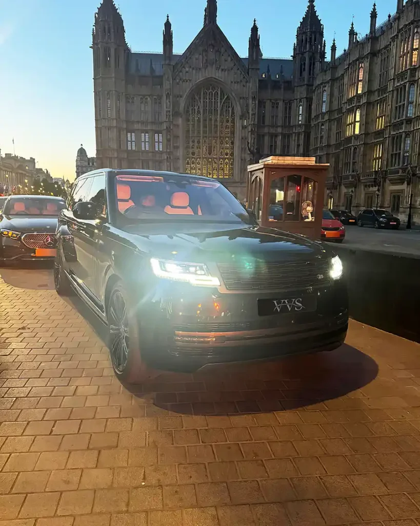 chauffeur-driven Range Rover autobiography parked outside of House of the Lords in London